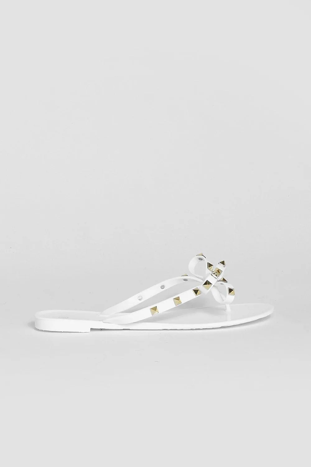 STUDDED BOW JELLY THONG SANDALS